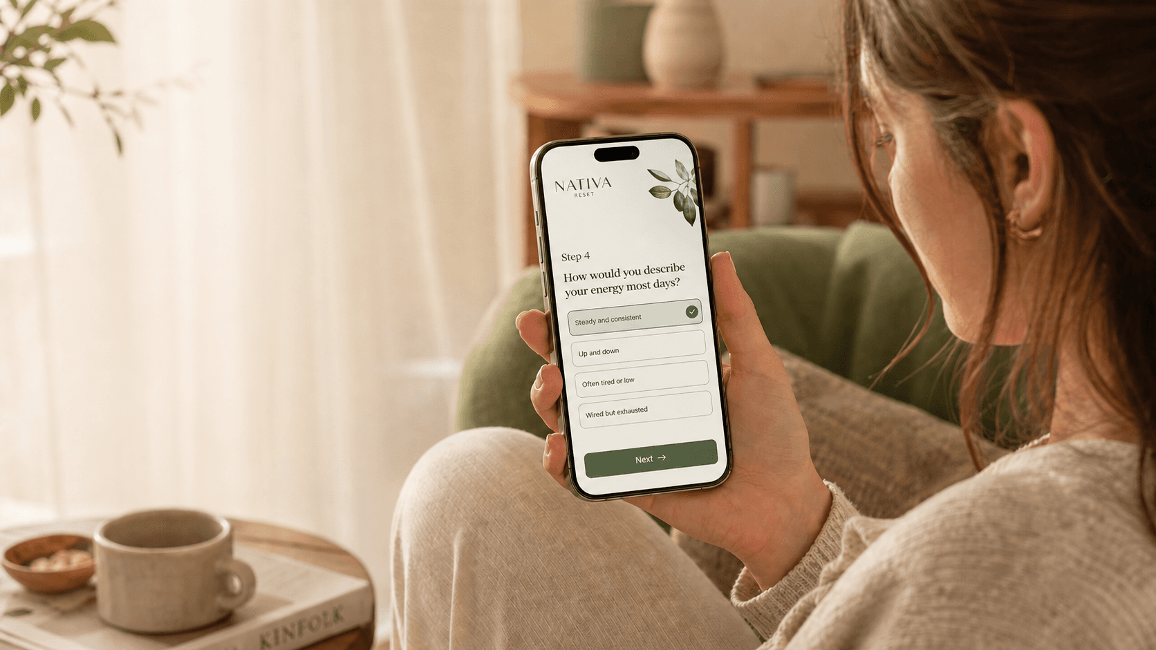 Person using phone with premium wellness quiz UI